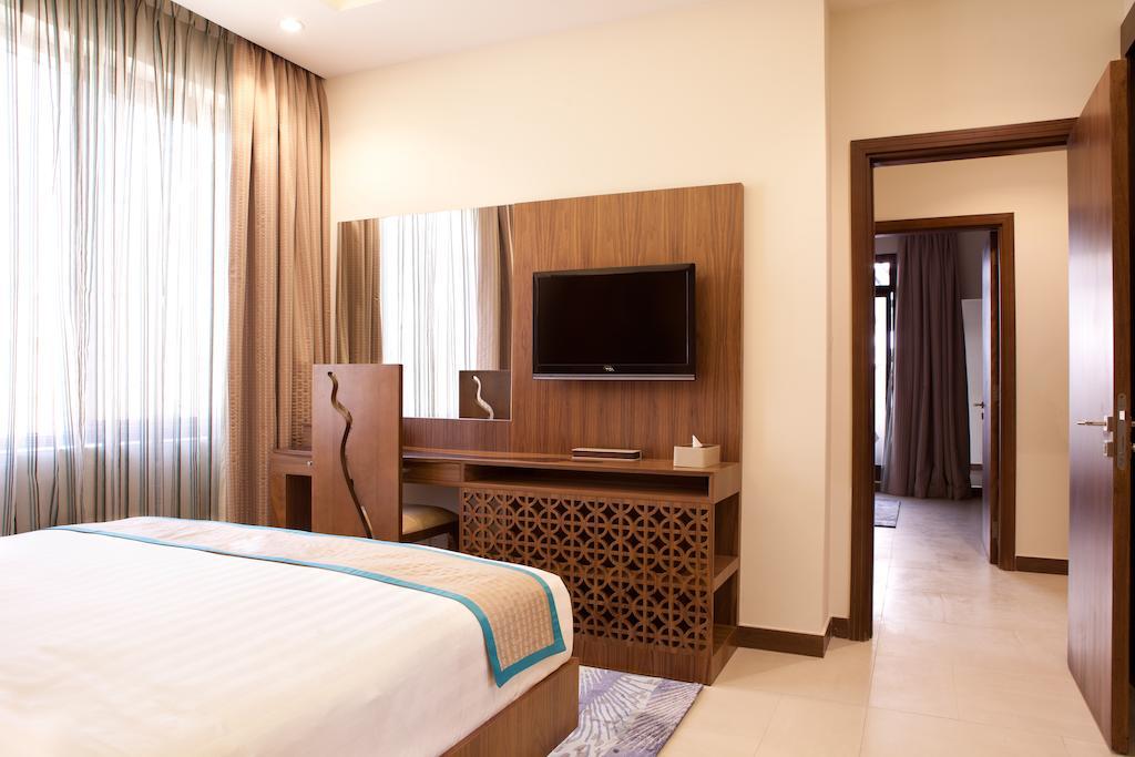 Noon Hotel Apartments Dubai Zimmer foto